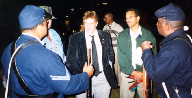 L-R Cpl. Norm Hill, Bill Archer, Harold Wells and Pvt. Gerald Wellington Confer After Evening Ceremony